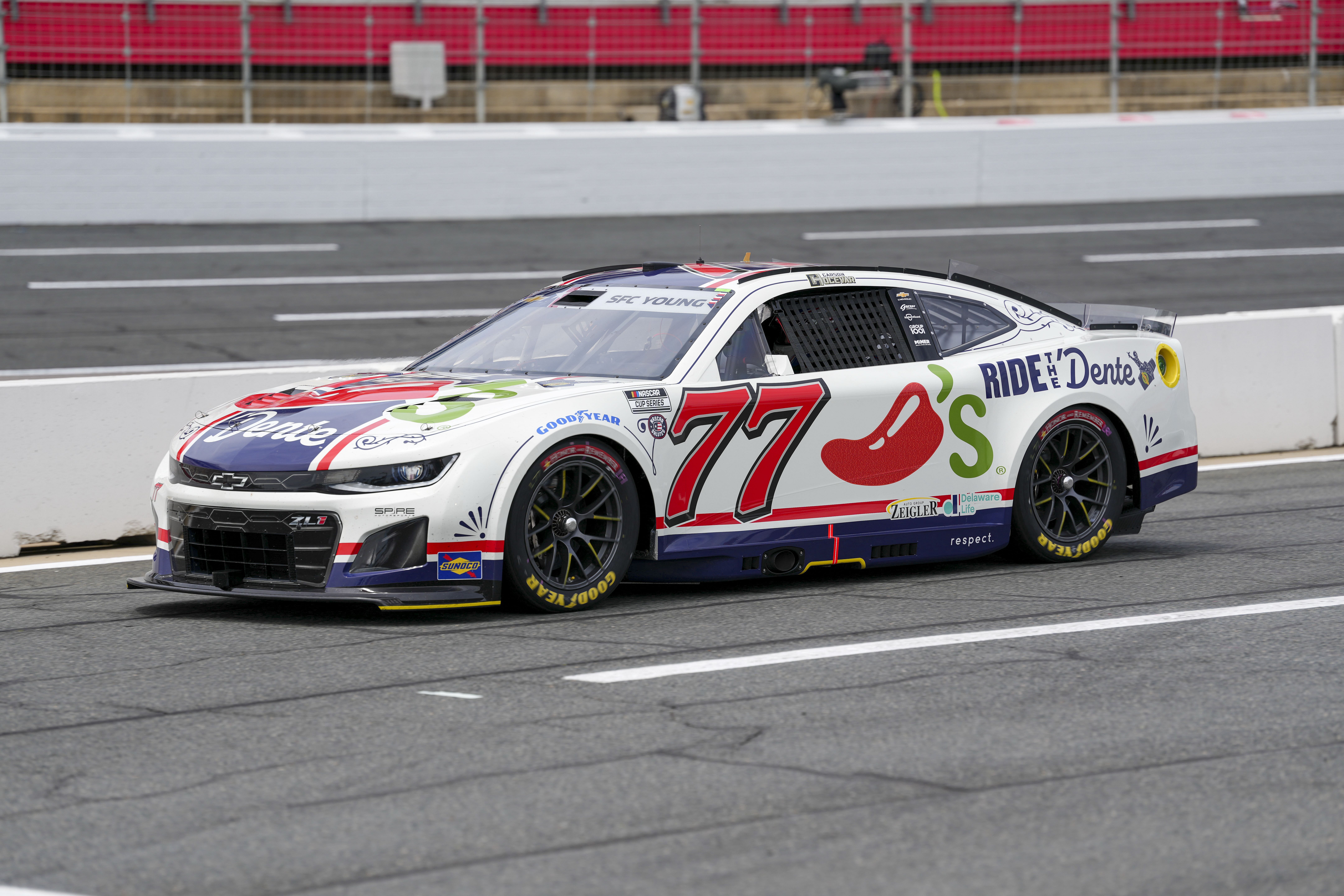 Carson Hocevar (77) during qualifying at Charlotte Motor Speedway. Credit: Jim Dedmon-Imagn